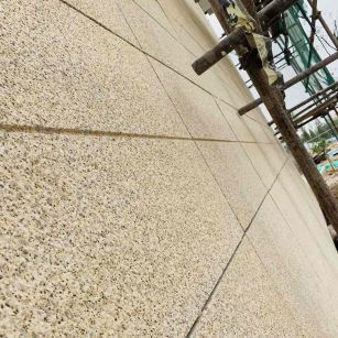 枣庄 黄金麻花岗岩荔枝面外墙干挂石材效果示例