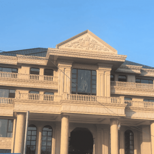 枣庄黄金麻别墅外墙干挂石材效果示例