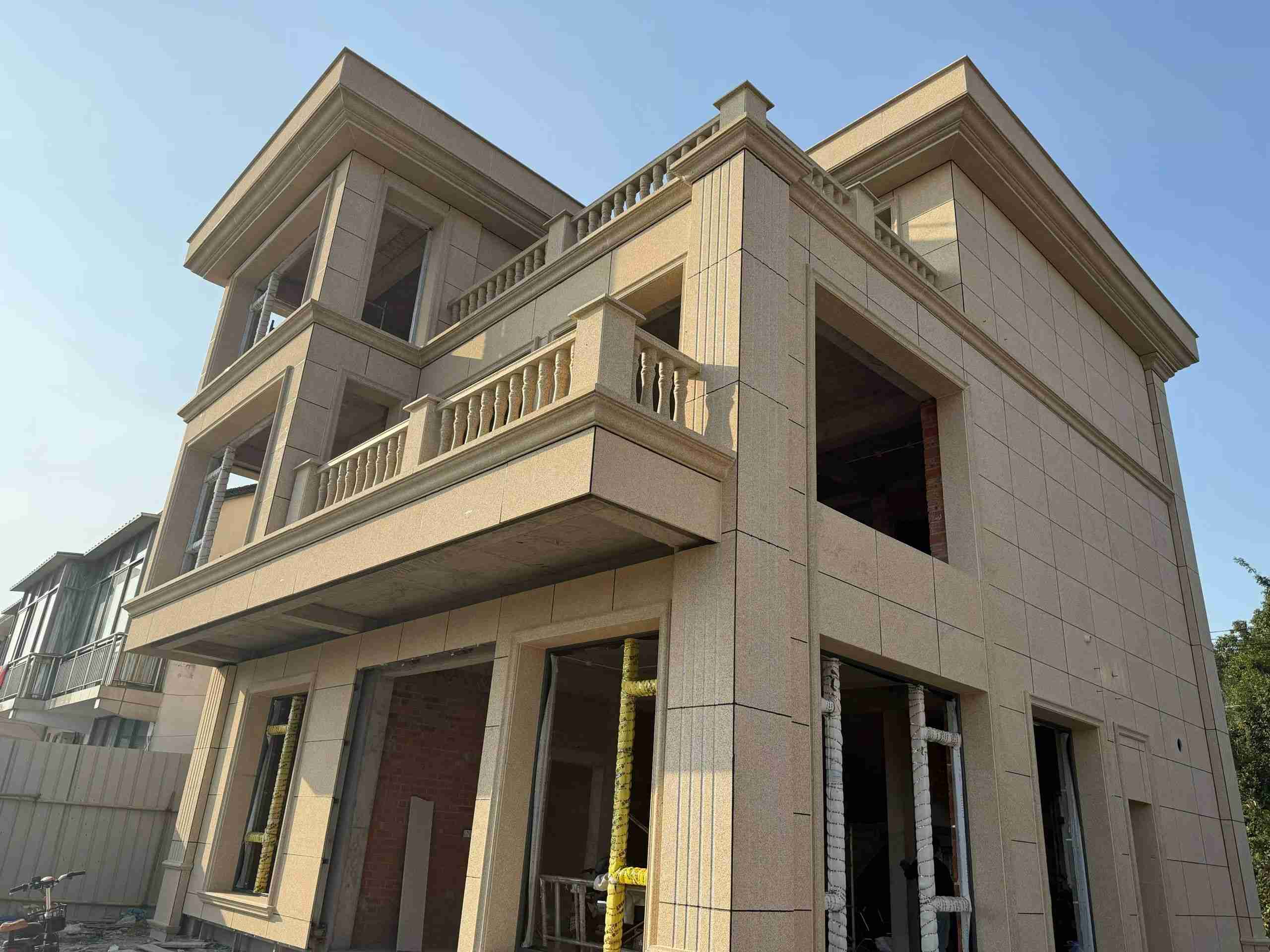 枣庄 黄金麻花岗岩石材荔枝面外墙干挂效果展示