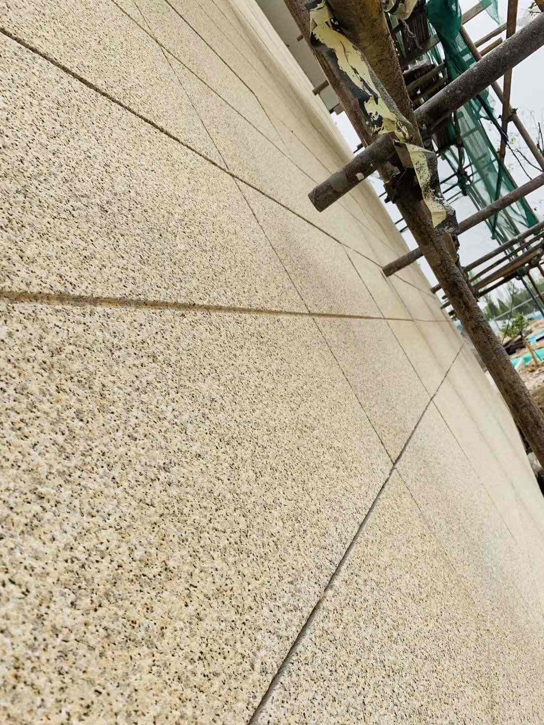 枣庄 黄金麻花岗岩荔枝面外墙干挂石材效果示例